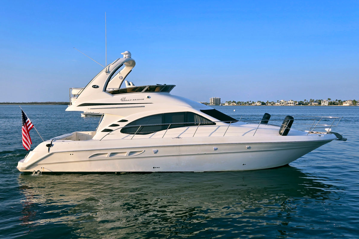 Daytime yacht cruise along Fort Myers Beach coastline